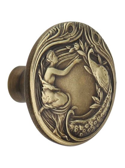 The Lady and The Peacock Cabinet Knob in Antique Brass.